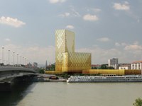 Naselje podnebju prijaznih hiš ter večnadstropne lesene hiše